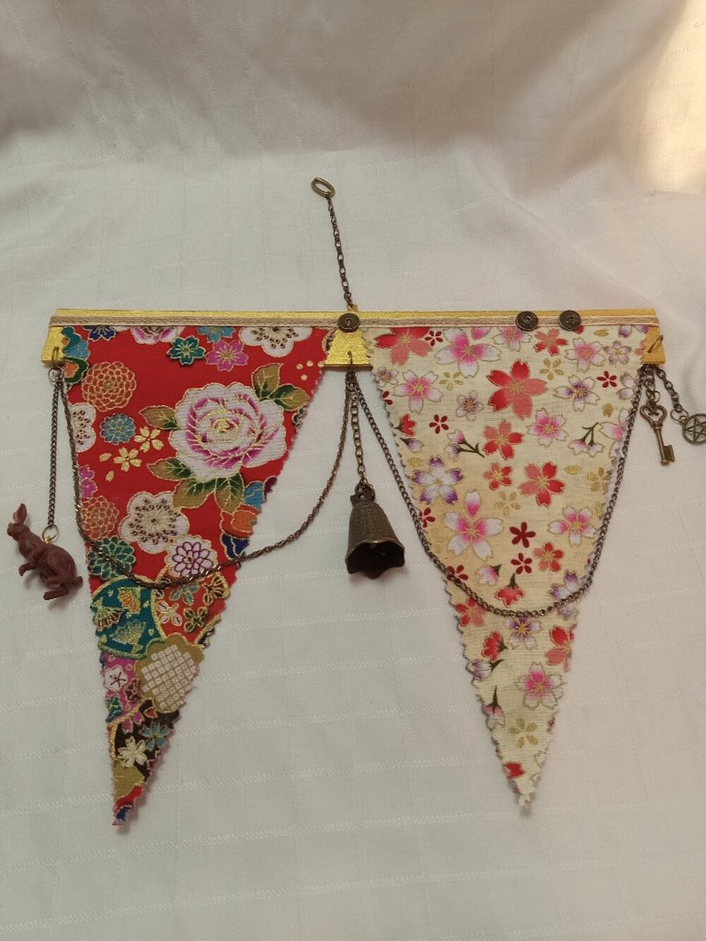 4-A reversible, handmade hanging banner made with fabric, chains, charms & coins